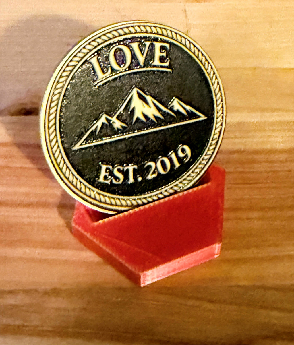 Actual photo of custom pet challenge coin back with LOVE and mountain design